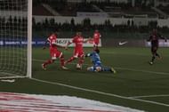 The defenders and the goalkeeper lacked communication between them.